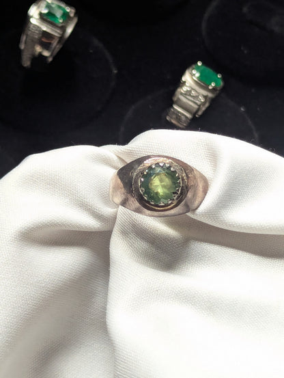 bezel set peridot men ring close up