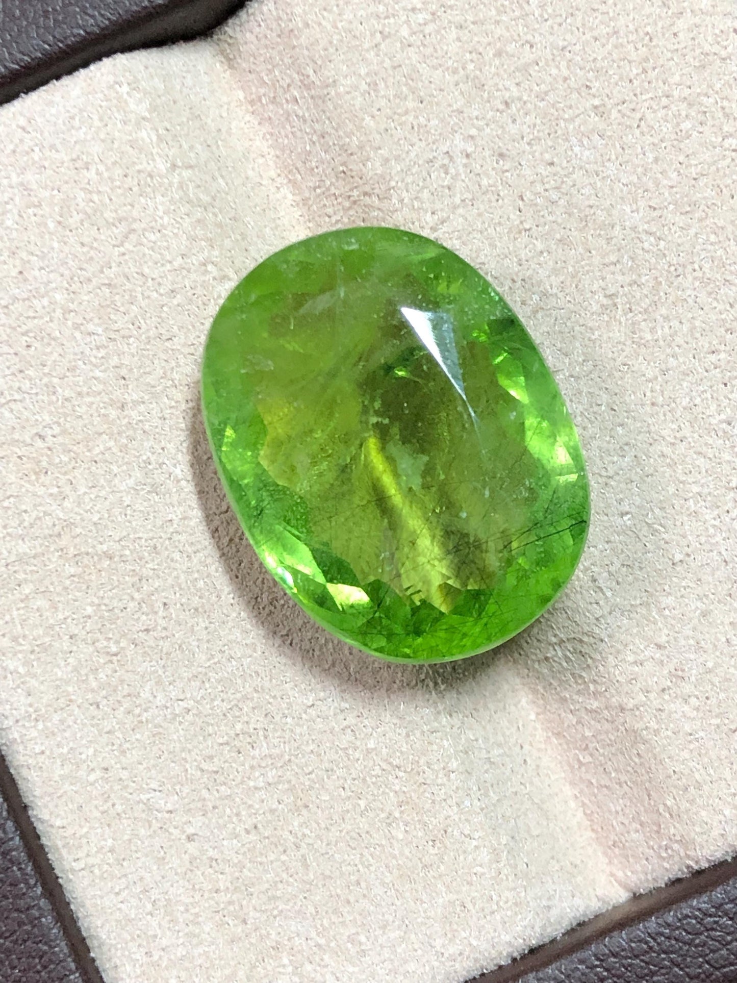 27.235 Carat Natural Peridot Gemstone: Oval Cut Green Gem