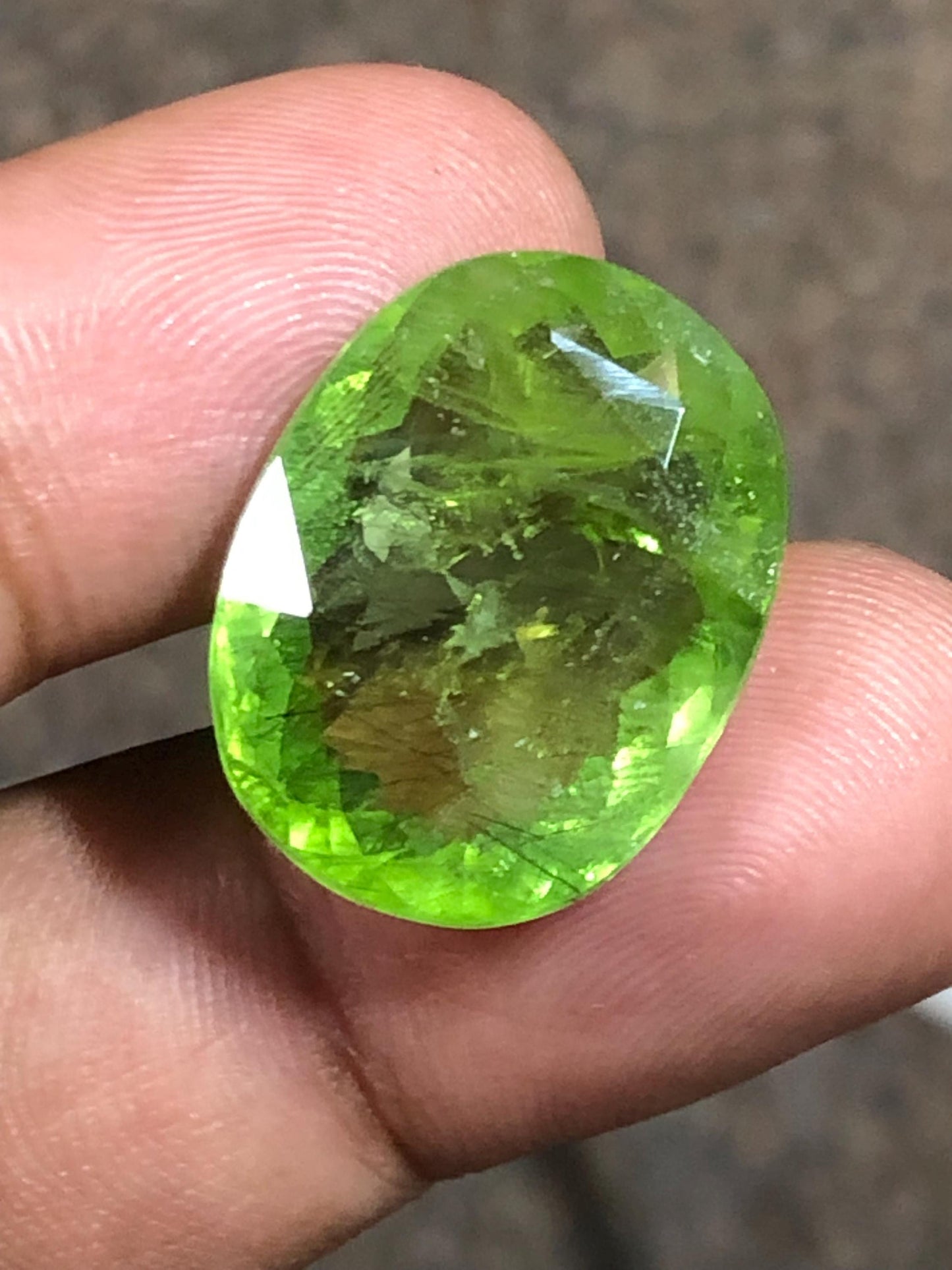 27.235 Carat Natural Peridot Gemstone: Oval Cut Green Gem