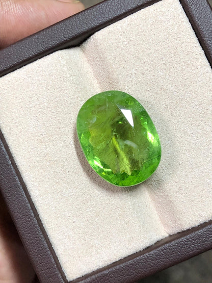 27.235 Carat Natural Peridot Gemstone: Oval Cut Green Gem