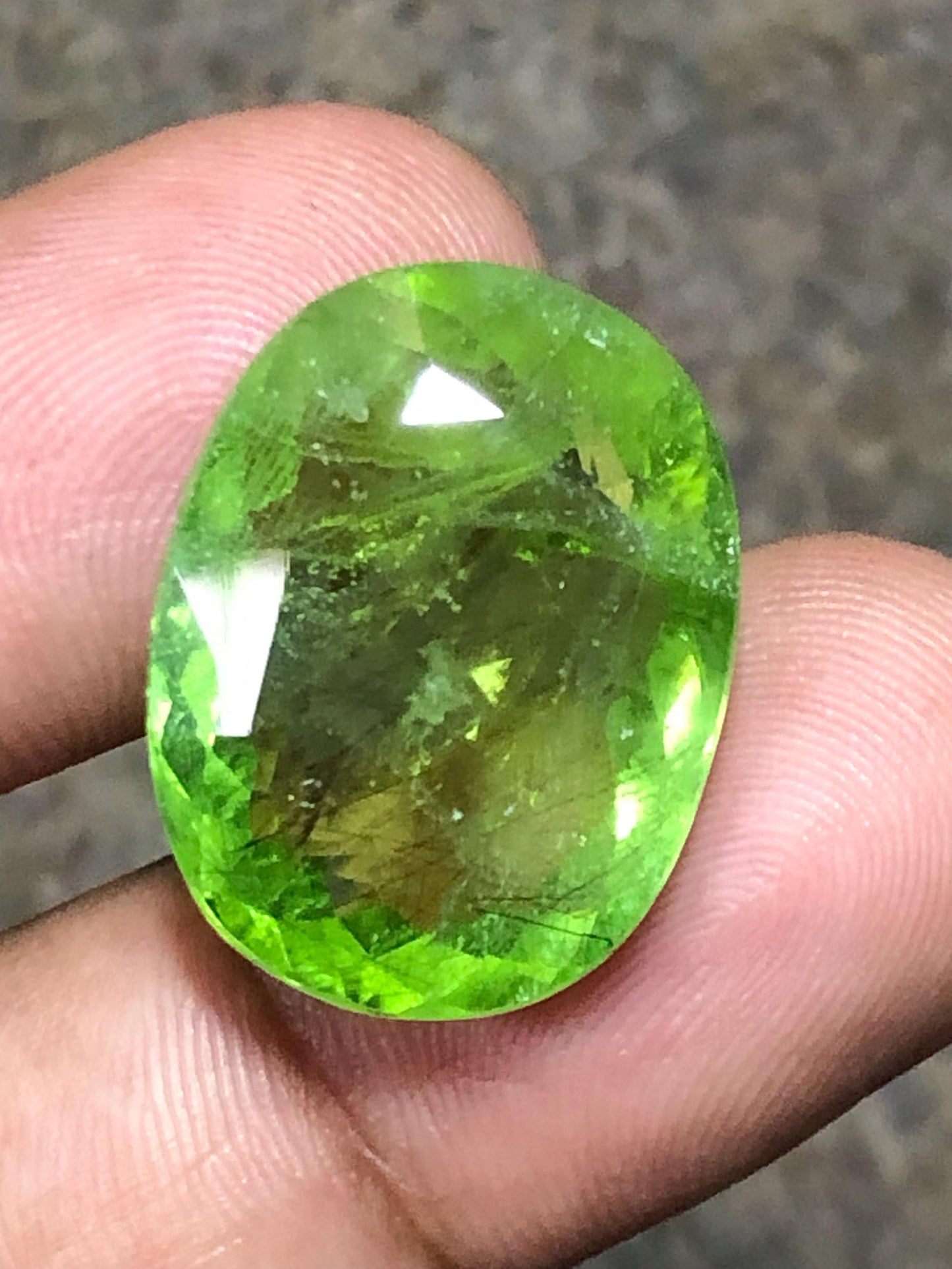 27.235 Carat Natural Peridot Gemstone: Oval Cut Green Gem
