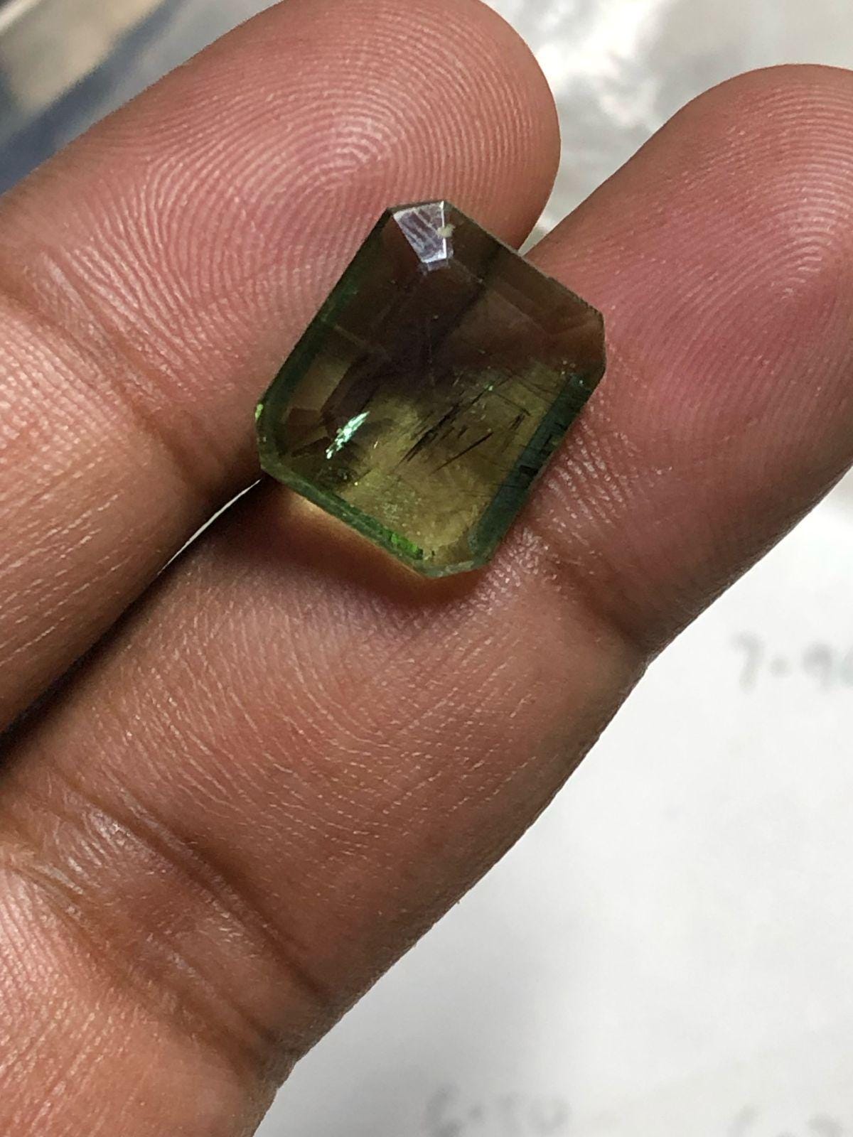 10.33 Carat Emerald Cut Natural Peridot Gemstone - Image 3