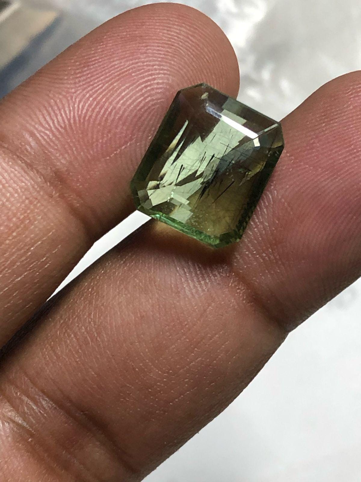 10.33 Carat Emerald Cut Natural Peridot Gemstone - Image 2