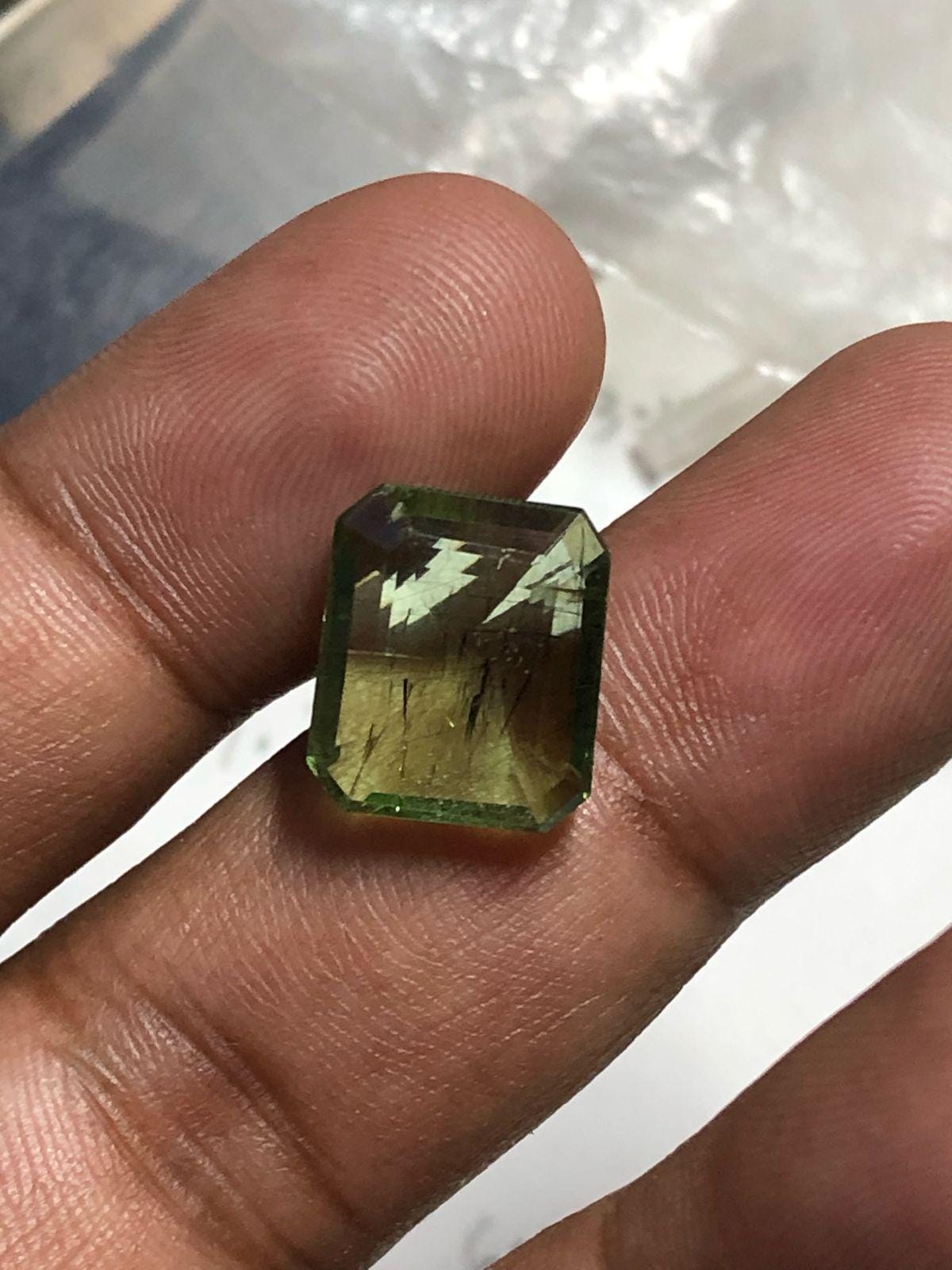 10.33 Carat Emerald Cut Natural Peridot Gemstone - Image 4