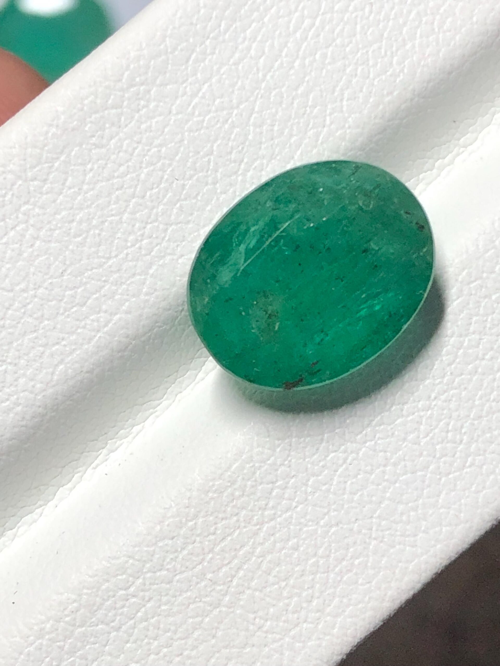 Zambian Emerald • 5.695 Carat Oval Cut Untreated Green Gemstone - Image 2