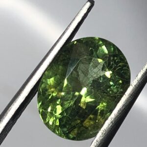 Natural Rutile Peridot Gemstone – Oval Cut Green Peridot with Black Needle Inclusions