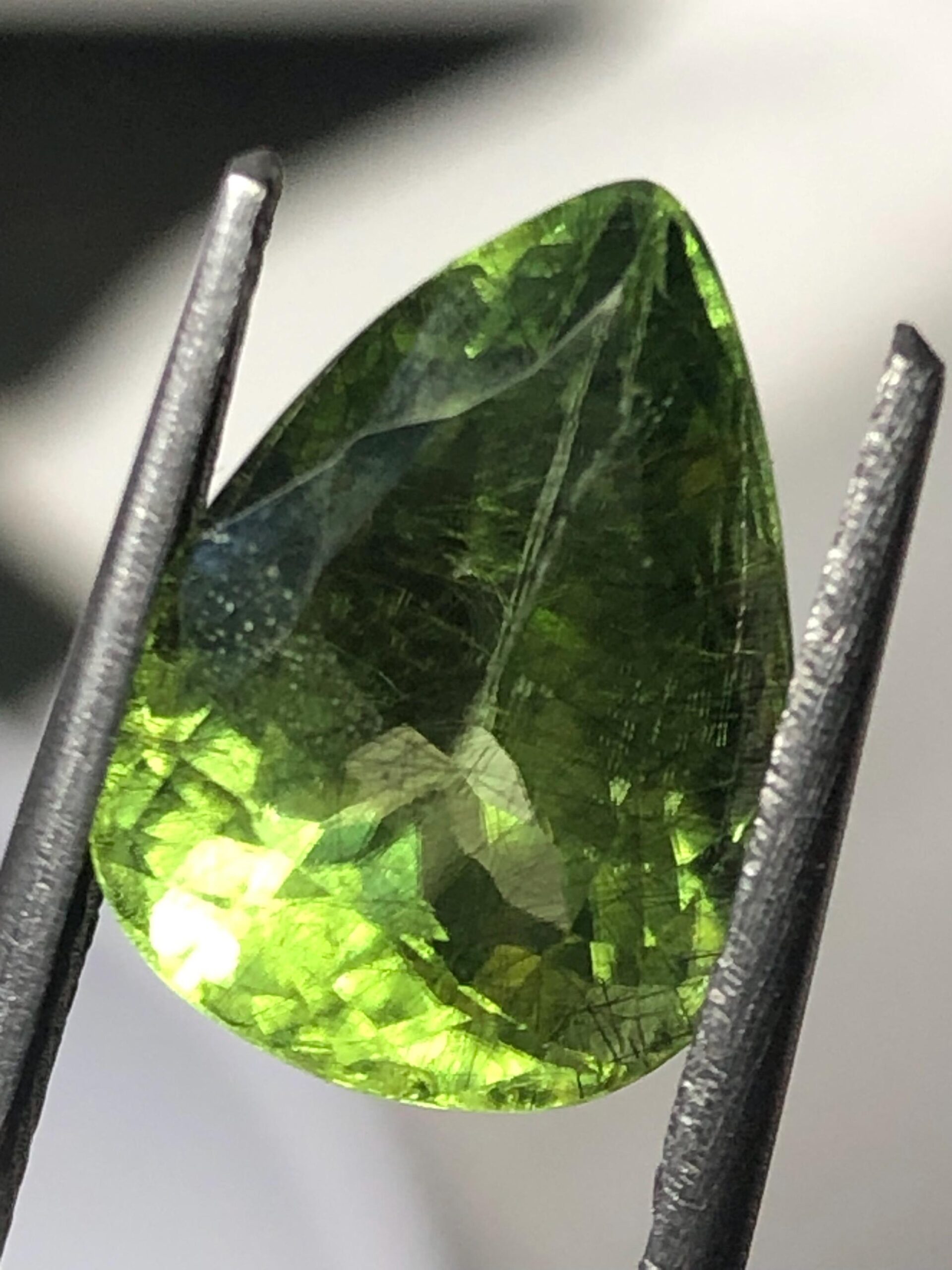 4.74 Ct Natural Rutile Peridot 9.1x12.4 mm Trillion Cut – Green Peridot with Needle Inclusions