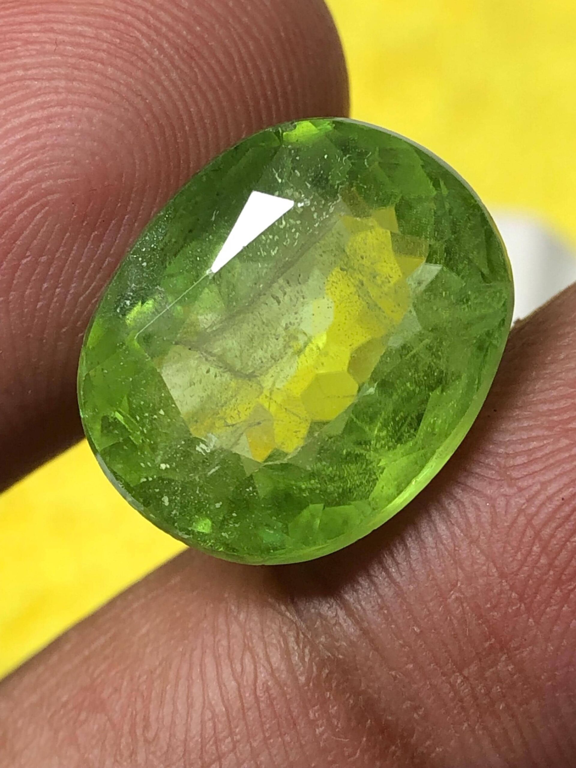 Natural Oval Peridot Gemstone: Pakistan Origin, 13.155 Carats, Faceted Green Loose Stone